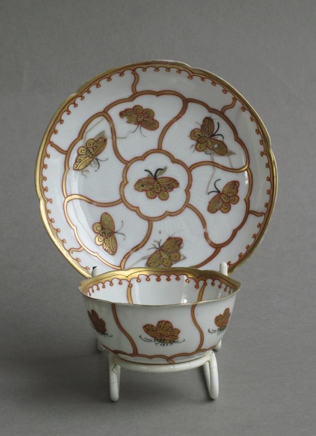 English decorated Chinese teabowl & saucer