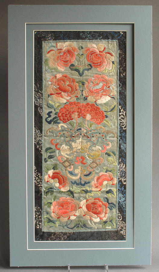 A pair of C19th Chinese silk sleeve bands