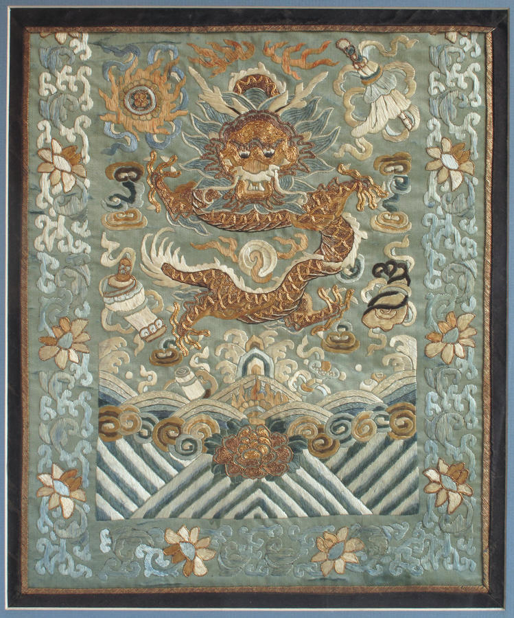 A C19th Chinese silk embroidered dragon panel