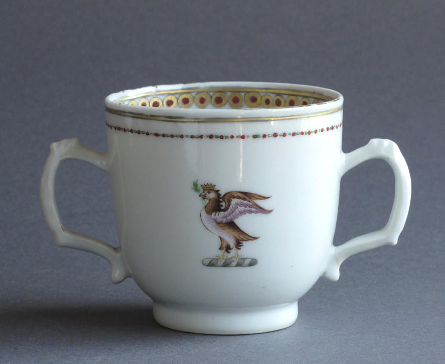 A Chinese armorial twin handled cup Qianlong
