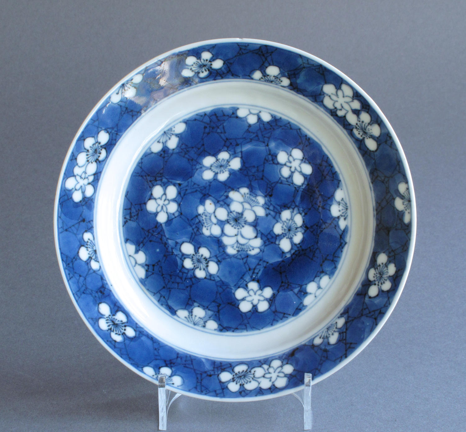 A Chinese 'prunus and cracked ice' plate, Kangxi