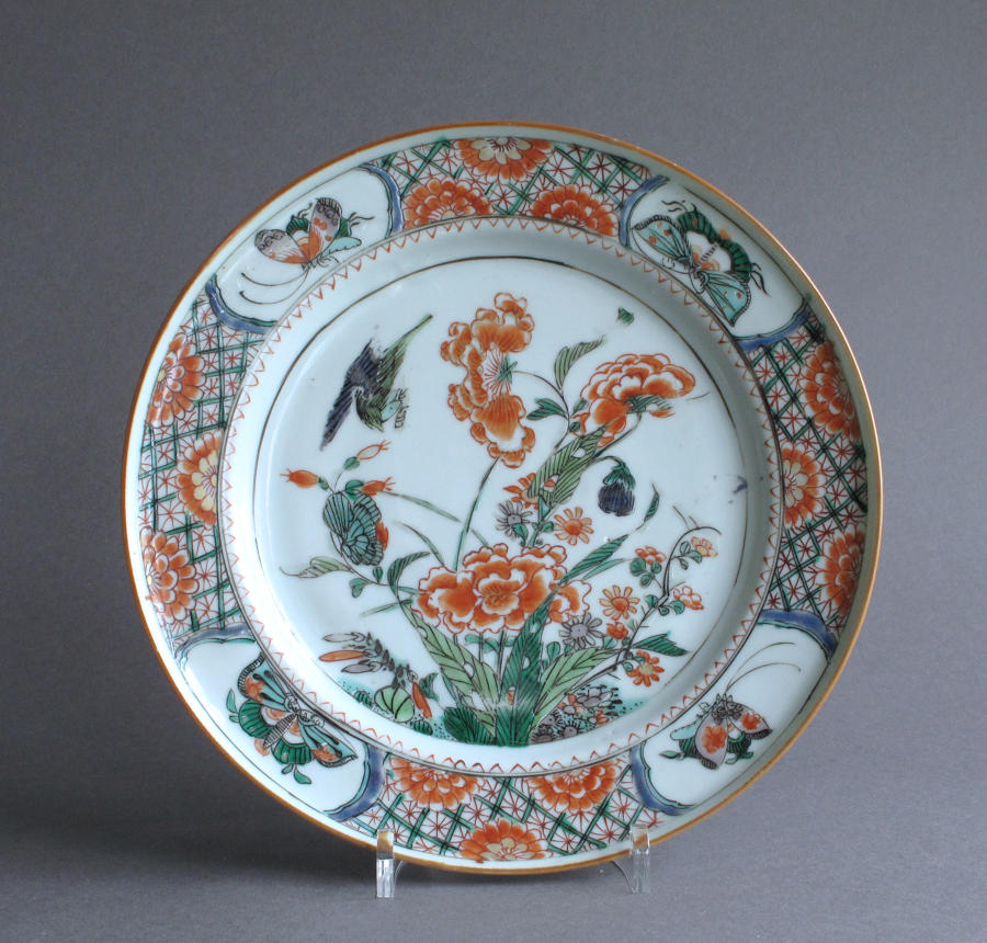 A Chinese famille verte plate with birds and peony, Kangxi