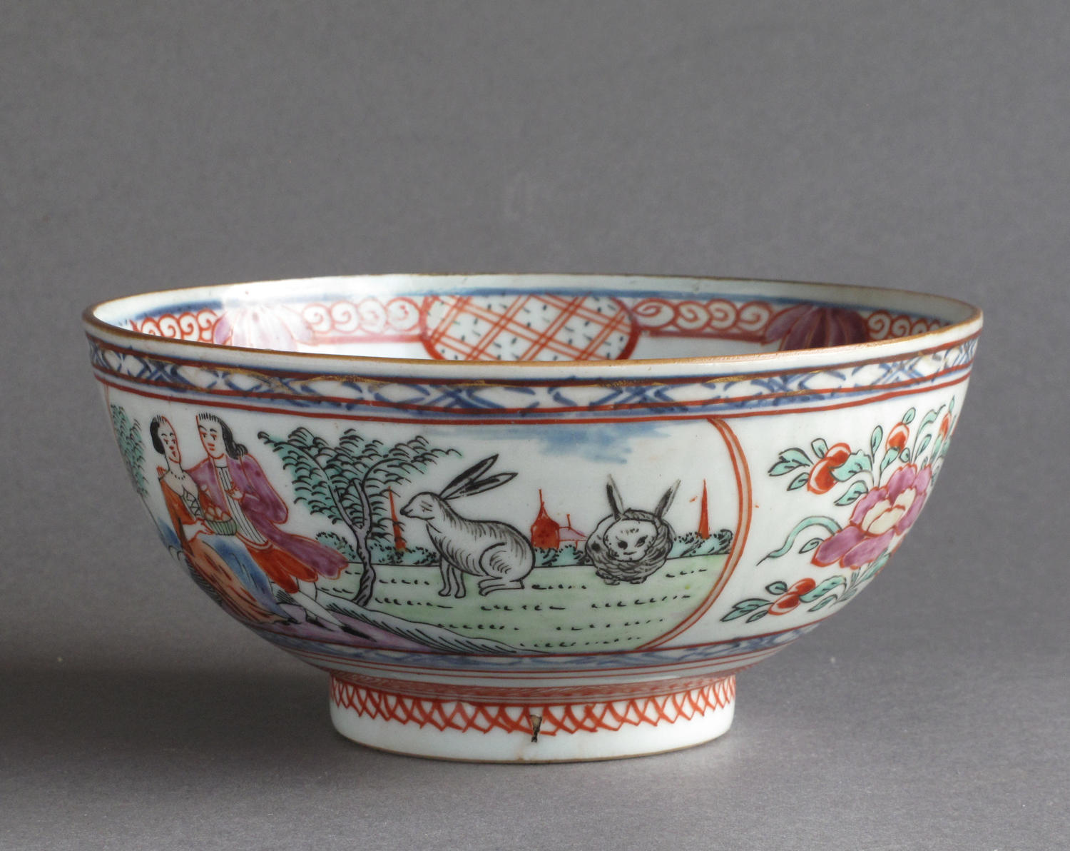 A Chinese bowl with Dutch decoration of people and rabbits, Qianlong