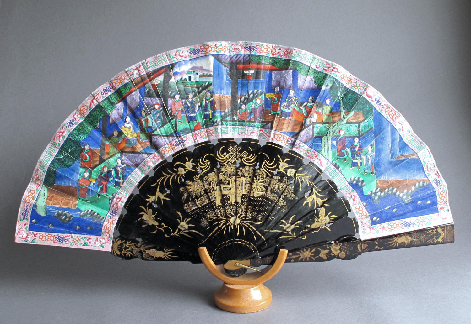 A Chinese export fan with black lacquered wooden sticks, late C19th