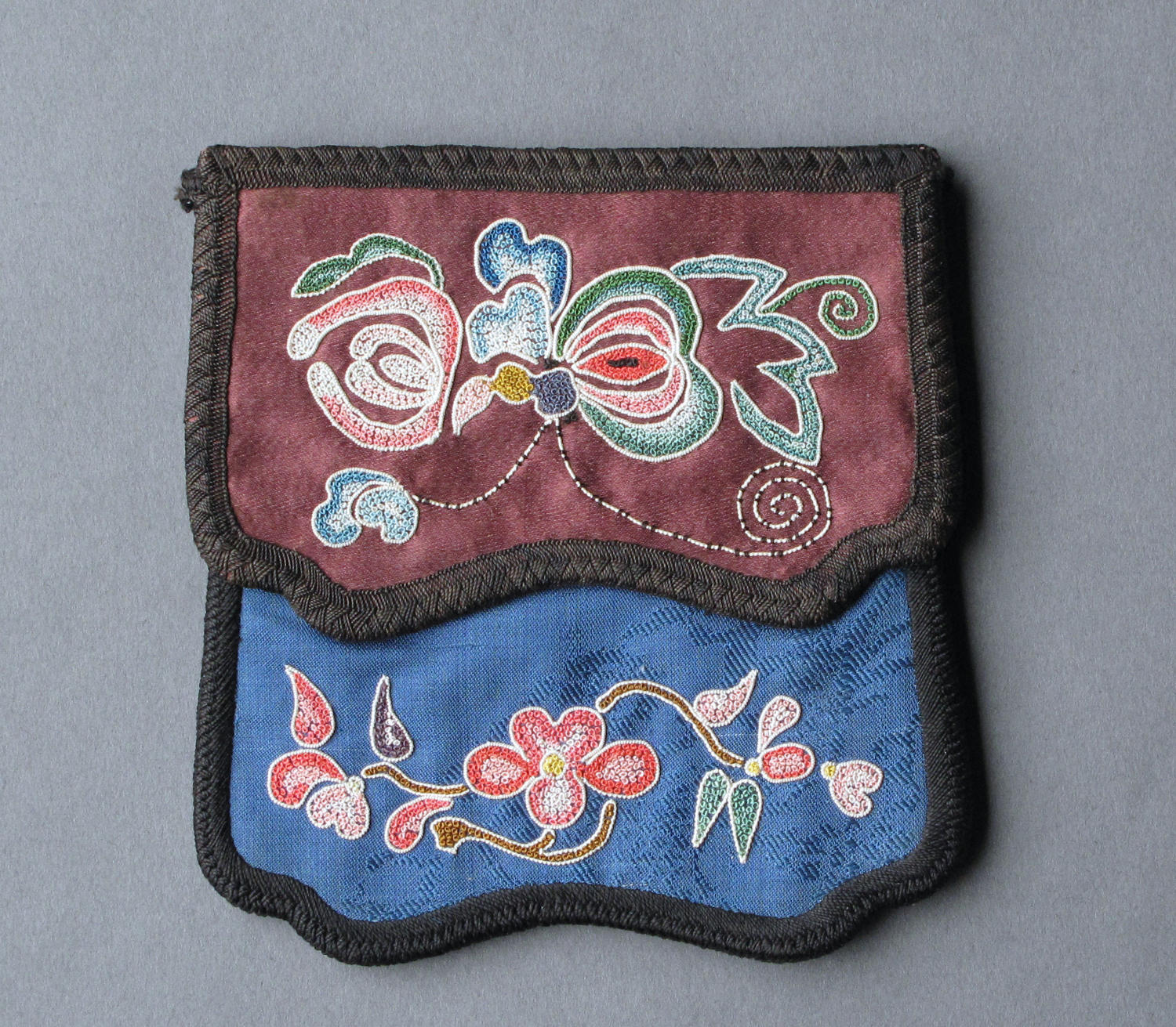A finely-embroidered Chinese silk square purse, c1910