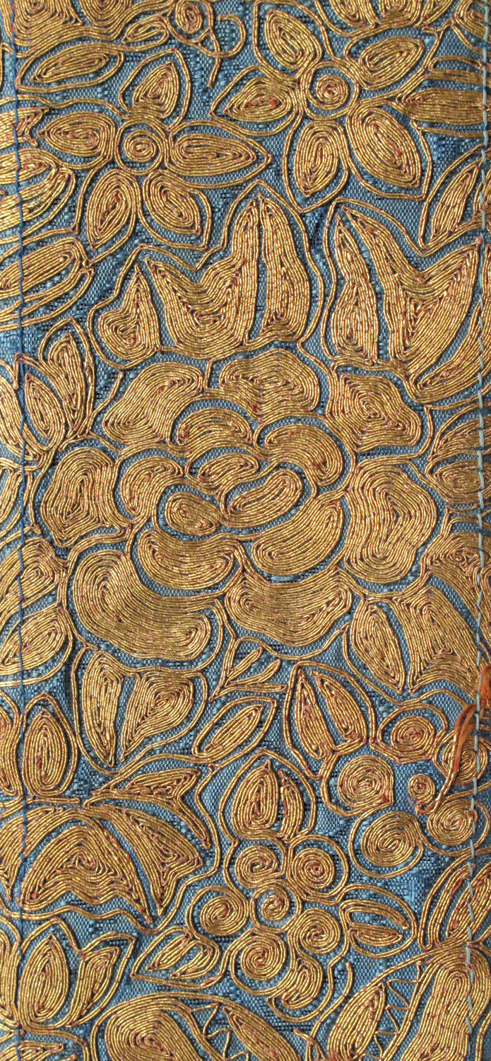 A good C19th Chinese sleeve band panel with gold couched embroidery