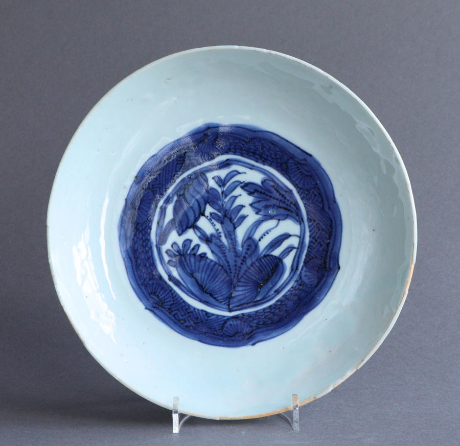 A Chinese late Ming saucer dish with lotus design, Wanli