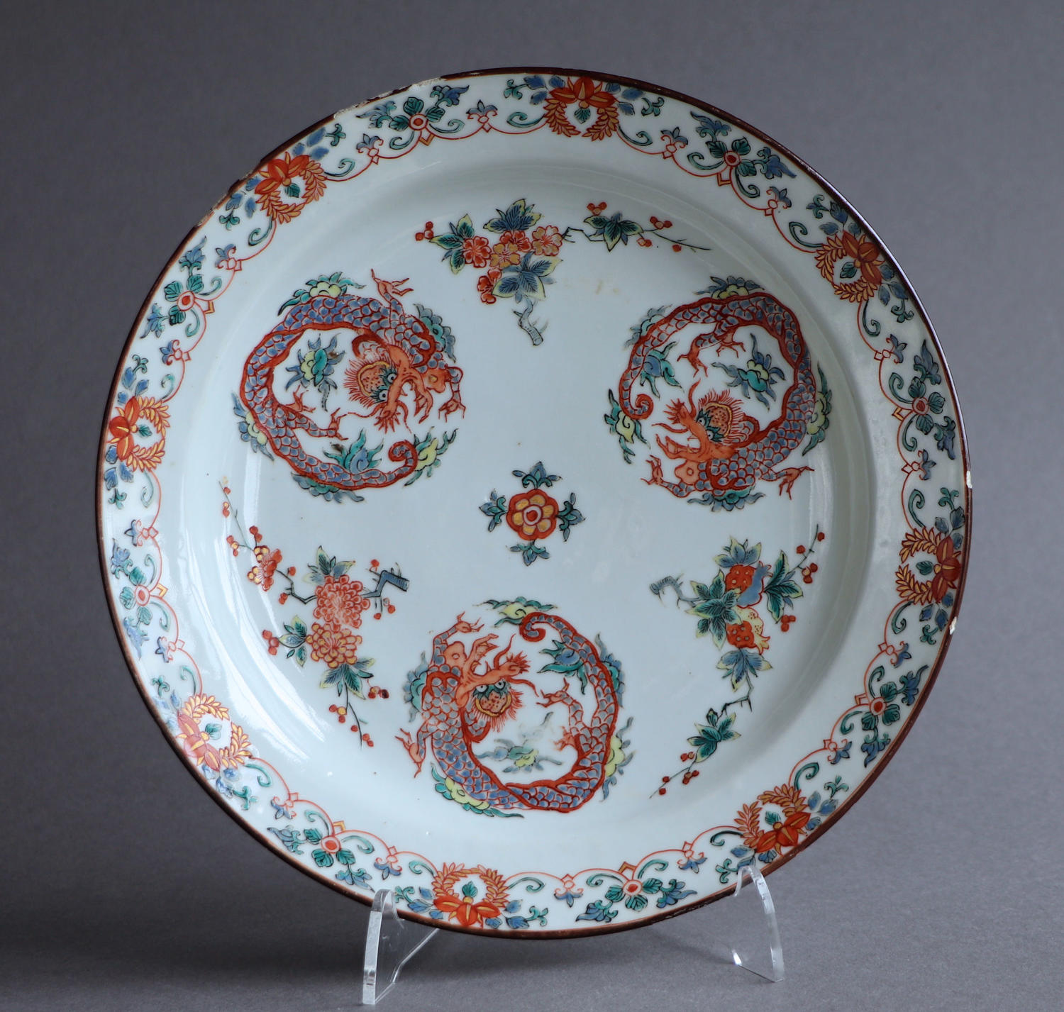 A good Dutch-decorated Chinese plate, Kangxi or Yongzheng