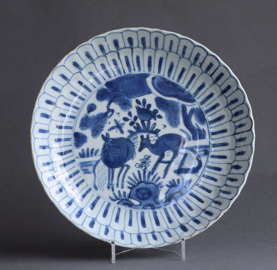 A Chinese late Ming dish with deer and pine trees