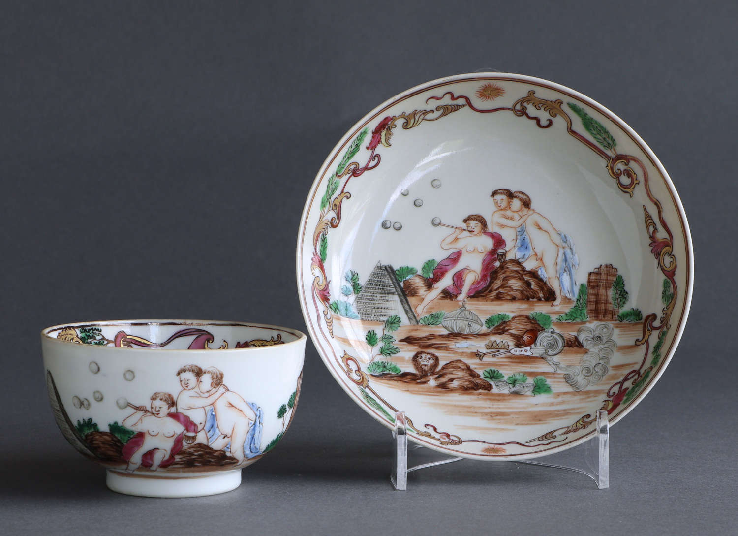 A rare Chinese export cup & saucer with European scene decoration