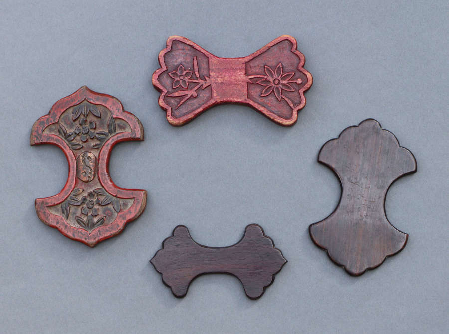 Four C19th Chinese wooden silk winders, priced separately