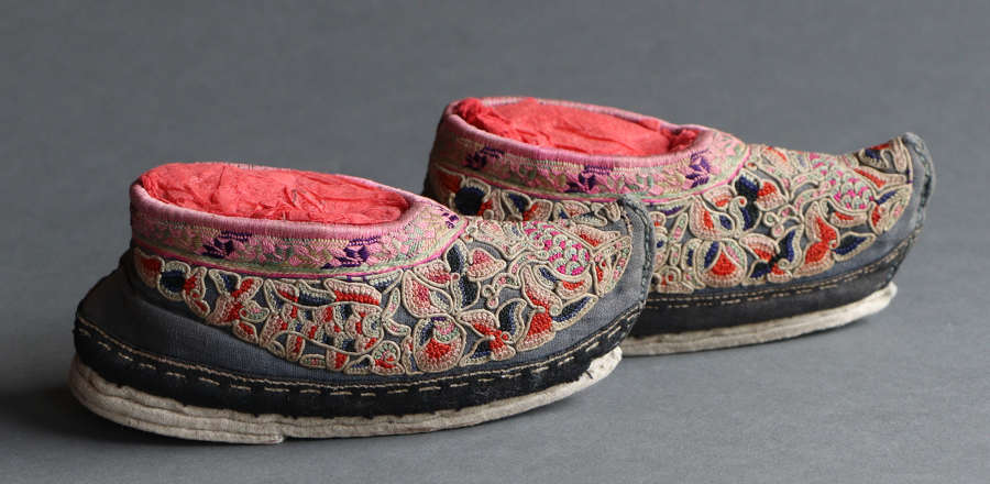 A pair of embroidered Chinese silk child’s shoes, late C19th