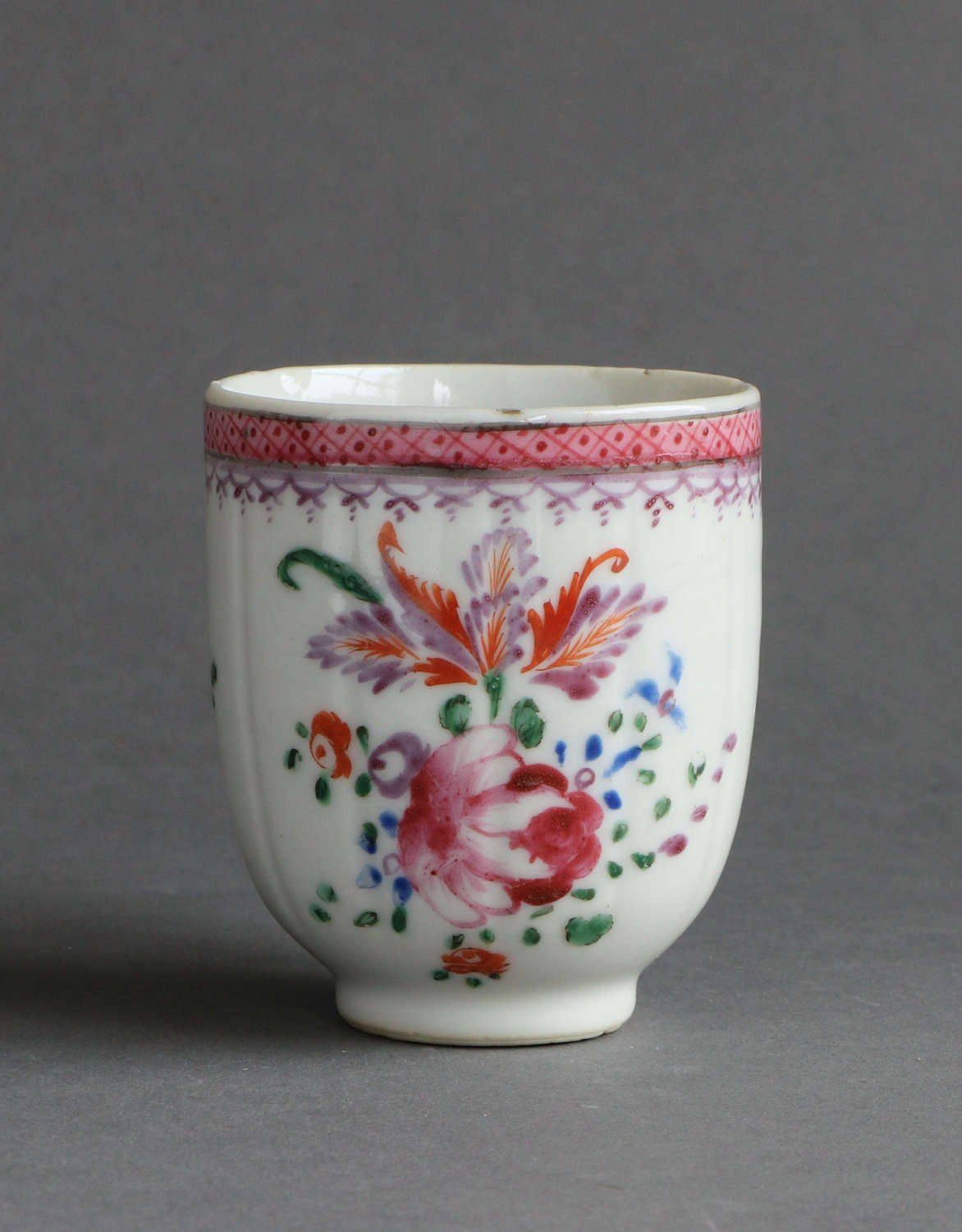 A Chinese export famille rose fluted coffee cup, Qianlong